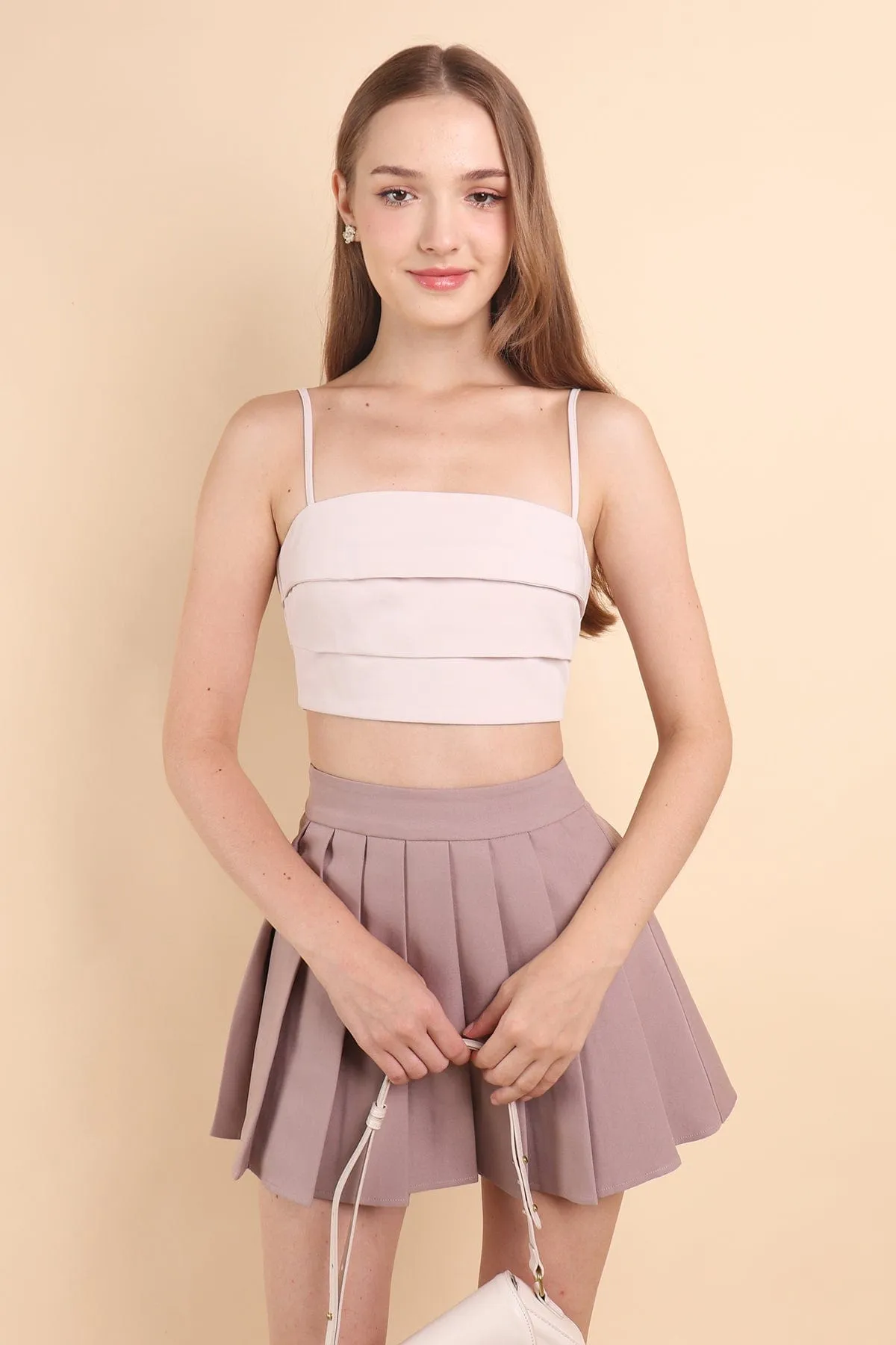 CAMU PLEATED SKIRT IN MAUVE